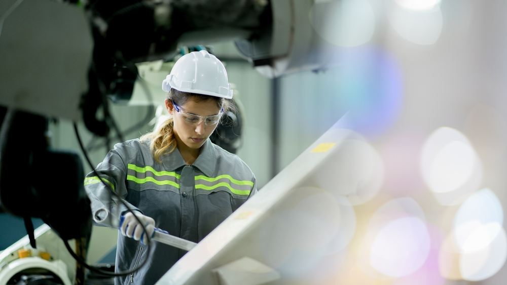 Female Engineer hard at work | Swoosh Finance