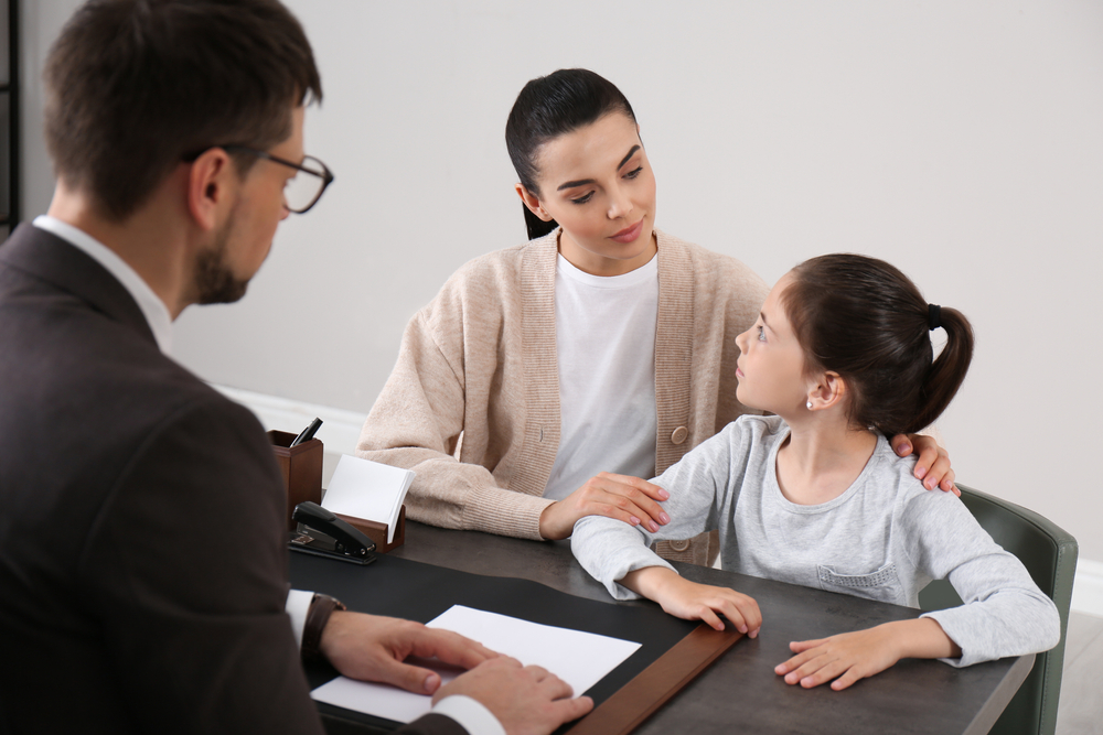 School Principal discussing options with new family | Swoosh Finance