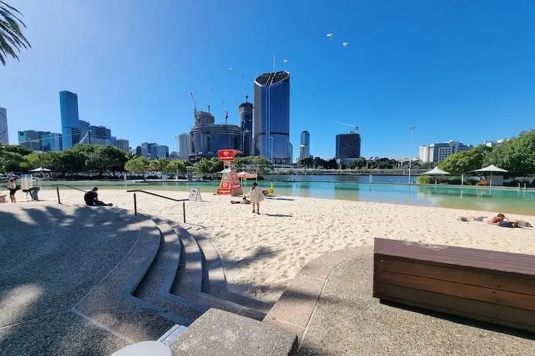 Streets Beach filled with people in South Bank Brisbane | Swoosh Finance