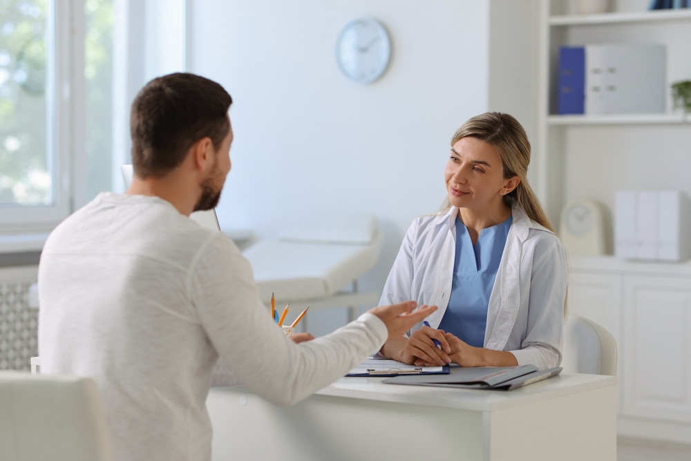 Doctor and Patient at an appointment | Swoosh Finance