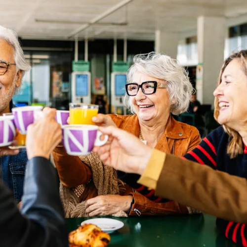 what is superannuation; group of friends toasting drinks | Swoosh Finance