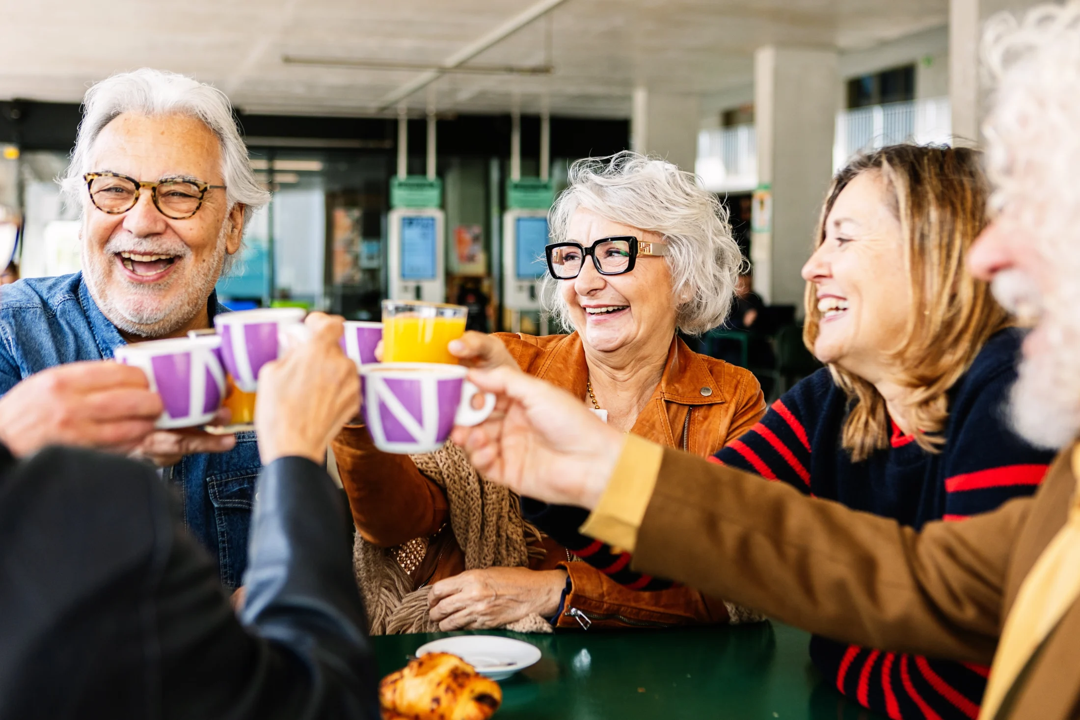 what is superannuation; group of friends toasting drinks | Swoosh Finance