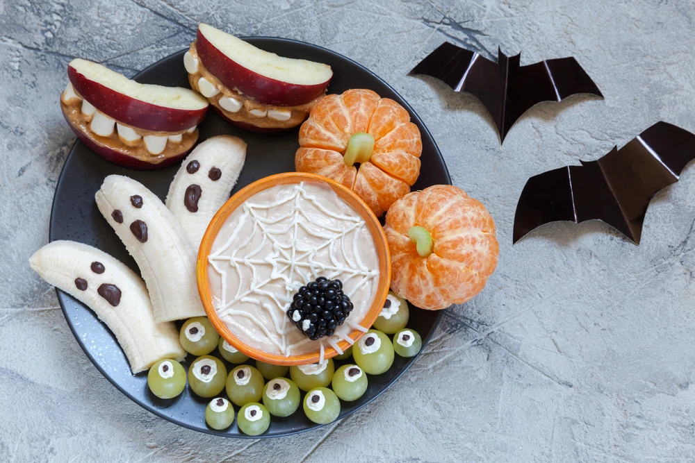 Fruit decorated to look ghosts, teeth, pumpkins and eyeballs | Swoosh Finance