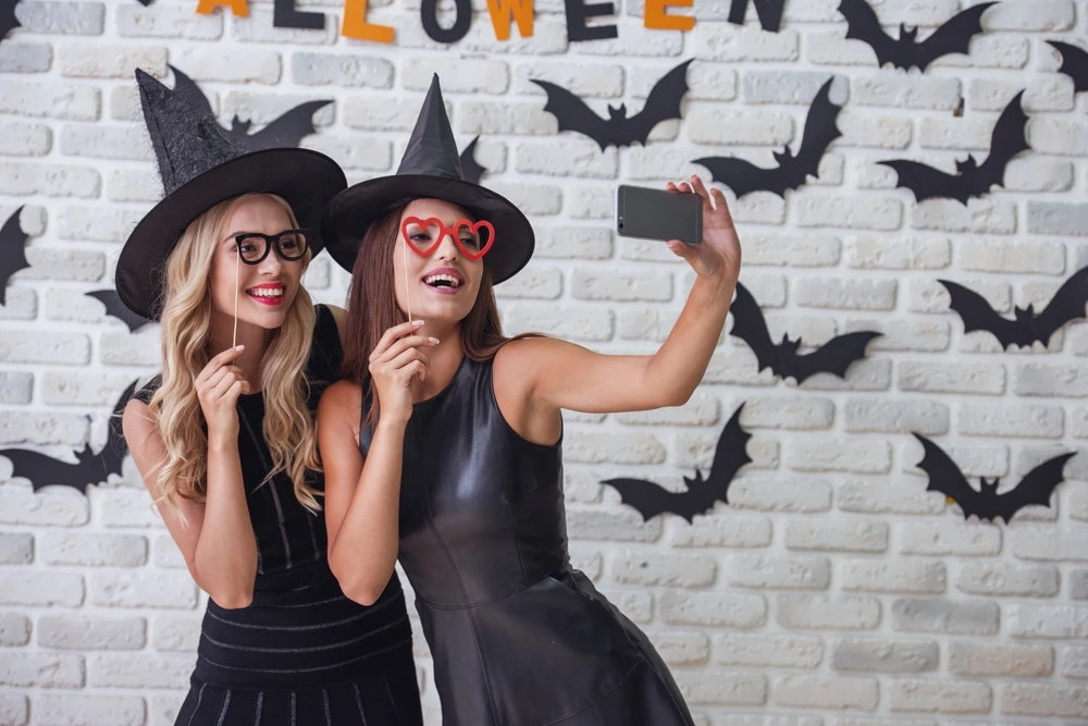 Girls dressing up for a Halloween fashion show | Swoosh Finance