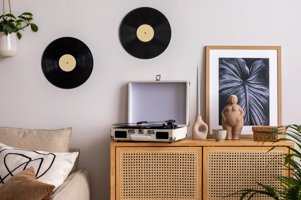 Displaying collectables in this cas Vinyl Records on the wall | Swoosh Finance