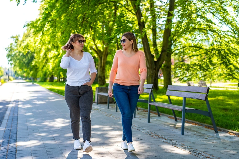 Friends going for a walk together | Swoosh Finance