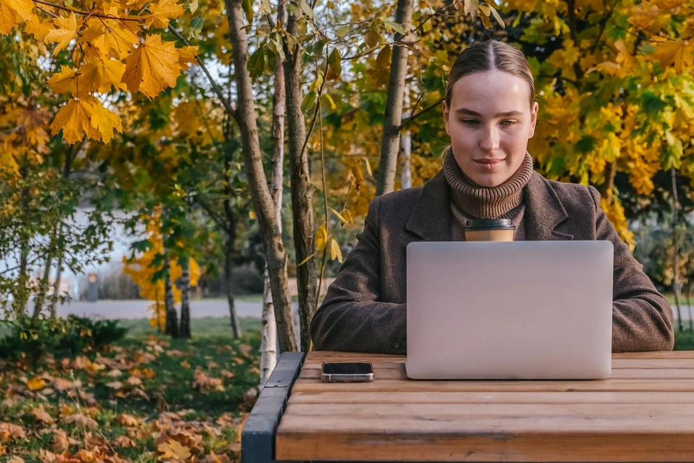 Lady watching her credit score increase | Swoosh Finance